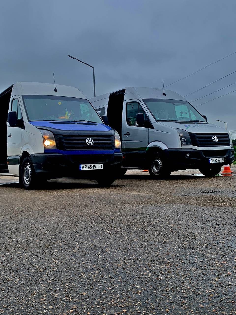 Two AlexTransfer minibuses