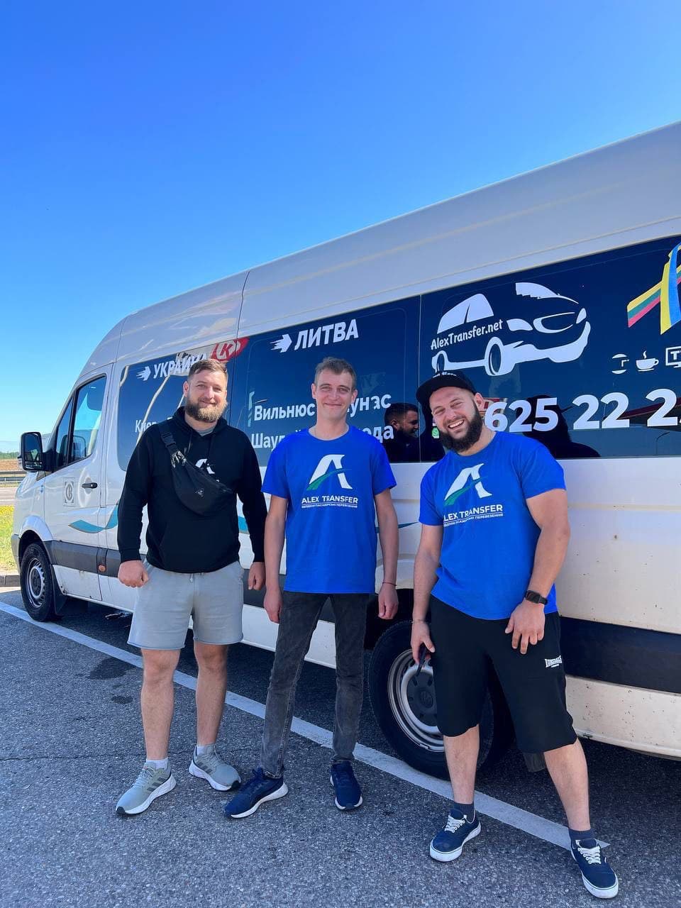 The AlexTransfer team by the minibus
